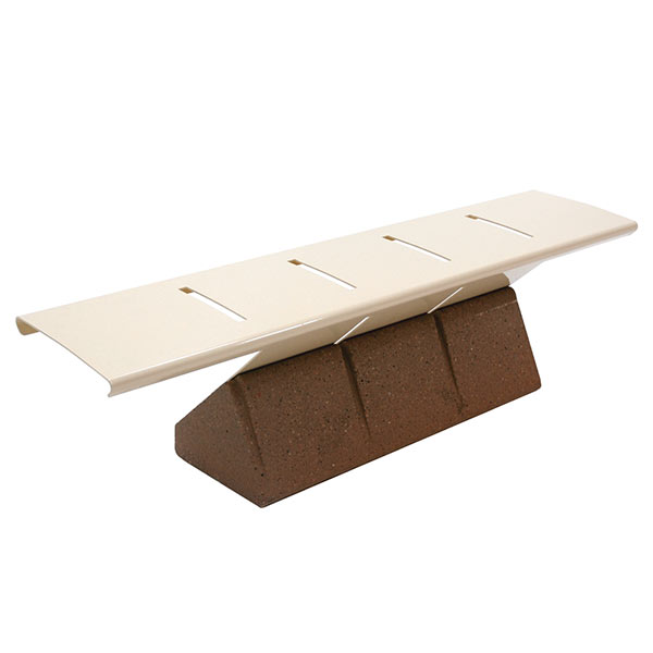This cantilever backless bench with a concrete base and a beige steel top is pictured against a white background.
